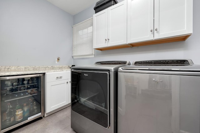 4502 Northwood Ave, Columbus, GA 31907 - laundry room with wine cooler, washing machine and dryer, and cabinet space