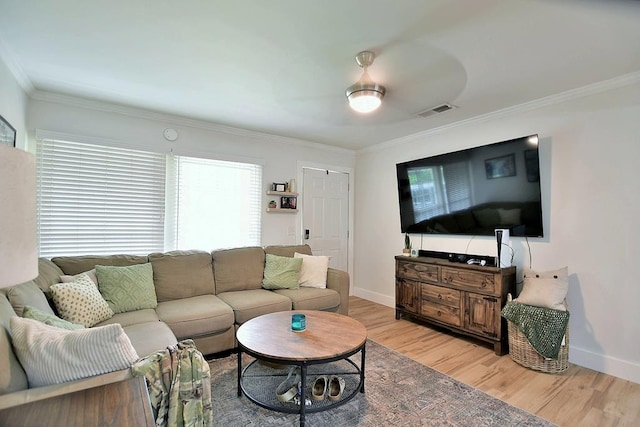 4502 Northwood Ave, Columbus, GA 31907 - living room with light wood finished floors, baseboards, ornamental molding, and ceiling fan