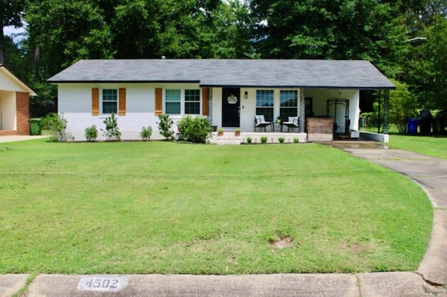 4502 Northwood Ave, Columbus, GA 31907 - single story home with covered porch, driveway, a front lawn, and an attached carport