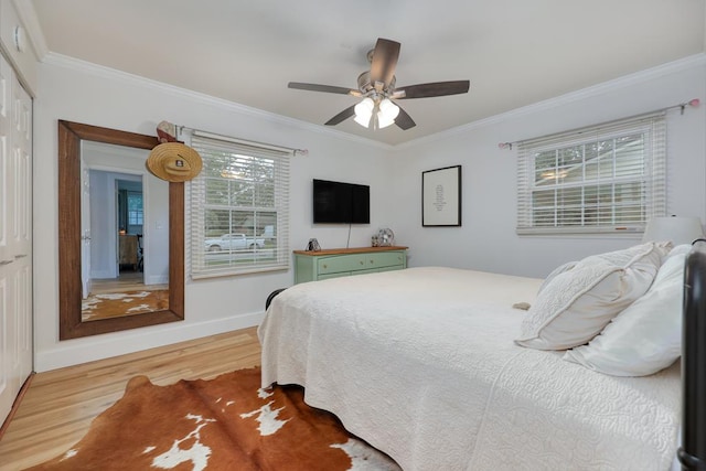 4502 Northwood Ave, Columbus, GA 31907 - bedroom featuring wood finished floors, ornamental molding, a ceiling fan, and a closet