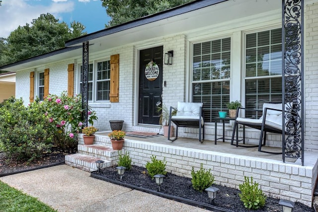 4502 Northwood Ave, Columbus, GA 31907 - view of exterior entry with covered porch and brick siding