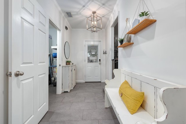 4502 Northwood Ave, Columbus, GA 31907 - mudroom featuring a chandelier, light tile patterned floors, and ornamental molding