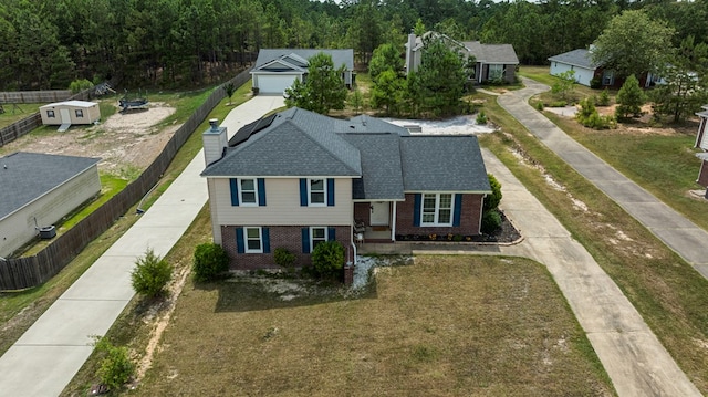 701 Crestline Dr, Columbus, GA 31907 - view of front of home with brick siding, driveway, and roof with shingles
