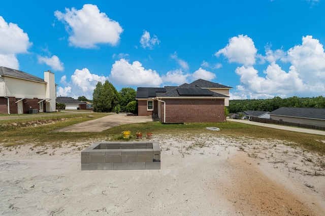 701 Crestline Dr, Columbus, GA 31907 - rear view of property featuring solar panels and brick siding