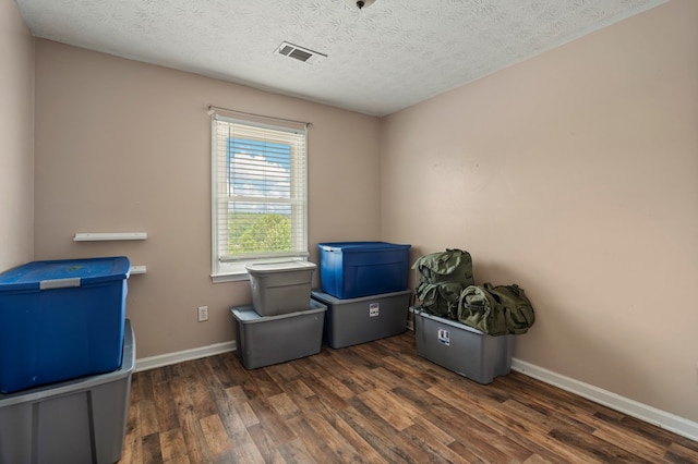 701 Crestline Dr, Columbus, GA 31907 - misc room with wood finished floors and a textured ceiling