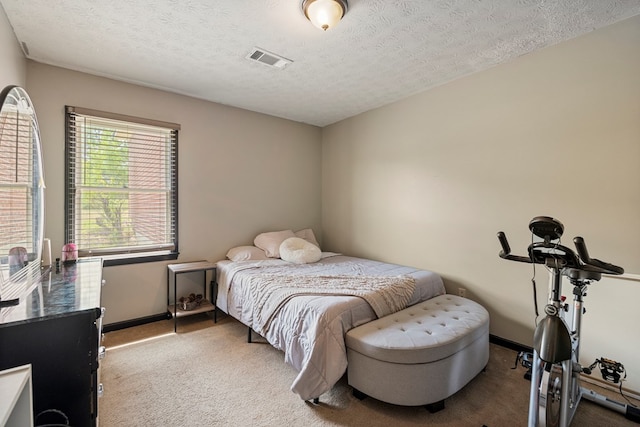 701 Crestline Dr, Columbus, GA 31907 - carpeted bedroom with baseboards and a textured ceiling