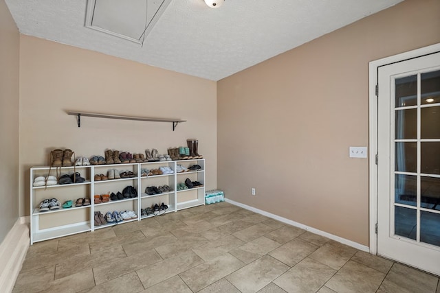 701 Crestline Dr, Columbus, GA 31907 - laundry room with a textured ceiling