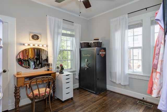 office featuring crown molding, wood finished floors, ceiling fan, baseboards, and visible vents