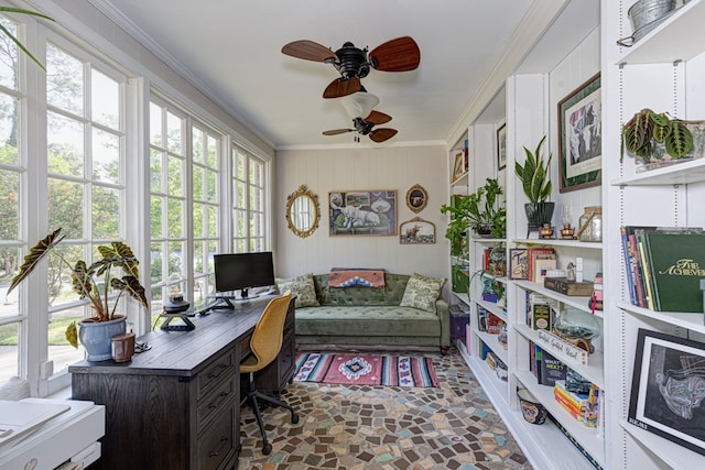 office featuring stone finish floor, ceiling fan, and ornamental molding