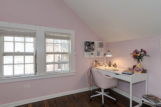 home office featuring lofted ceiling, baseboards, and wood finished floors