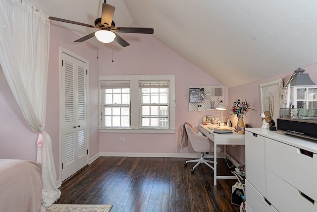 home office with lofted ceiling, hardwood / wood-style flooring, baseboards, and a ceiling fan