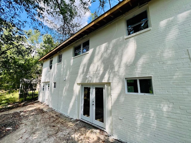 view of property exterior with french doors