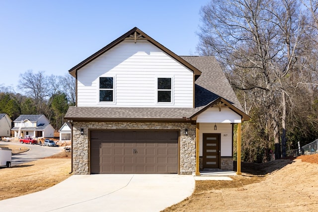 view of front of property with a garage