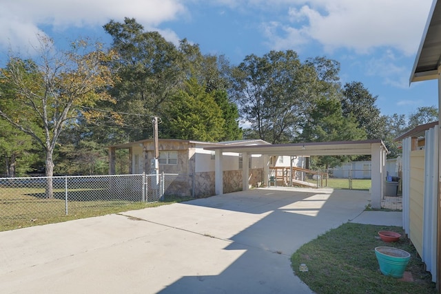 view of patio / terrace with a carport