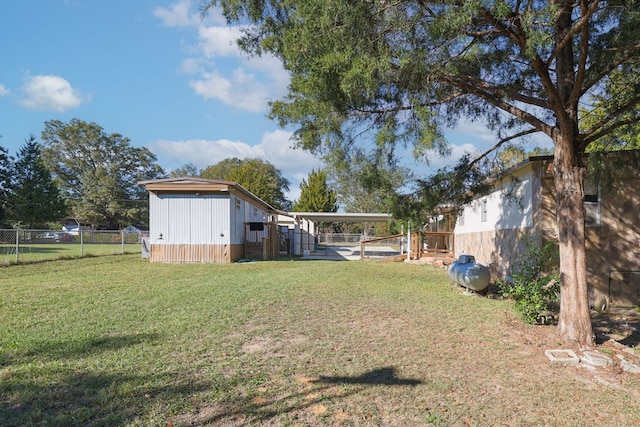 view of yard with a carport