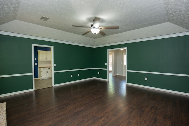 6036 Whitehaven Dr, Columbus, GA 31909 - unfurnished bedroom featuring dark wood-type flooring, multiple windows, and a textured ceiling