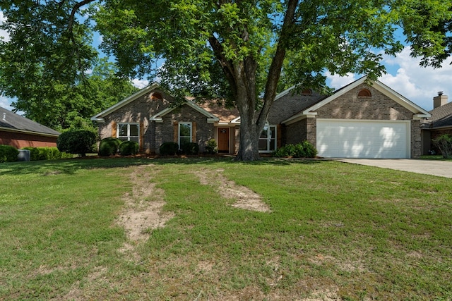 5437 Chatham Woods Ct, Columbus, GA 31907 - view of front of house featuring concrete driveway, an attached garage, a front lawn, and brick siding