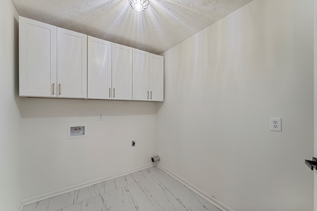 5437 Chatham Woods Ct, Columbus, GA 31907 - laundry room featuring cabinet space, hookup for a washing machine, marble finish flooring, and electric dryer hookup