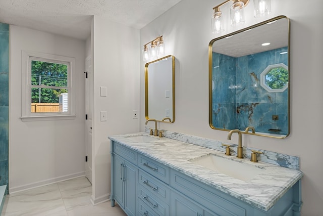 5437 Chatham Woods Ct, Columbus, GA 31907 - full bath featuring marble finish floors, double vanity, a shower, and a textured ceiling