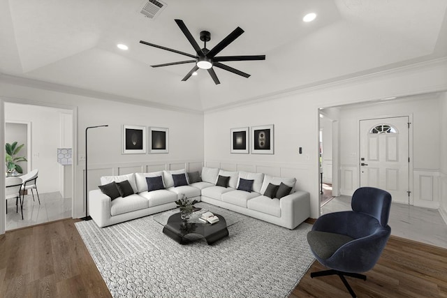 5437 Chatham Woods Ct, Columbus, GA 31907 - living room featuring a tray ceiling, recessed lighting, a ceiling fan, wood finished floors, and a decorative wall