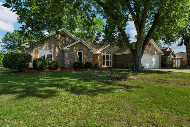 5437 Chatham Woods Ct, Columbus, GA 31907 - view of front of house with a garage, driveway, a front lawn, and brick siding