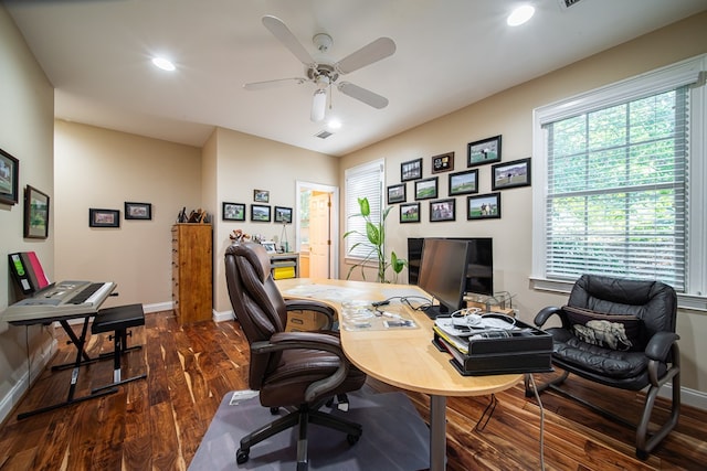 office area with ceiling fan and dark hardwood / wood-style flooring