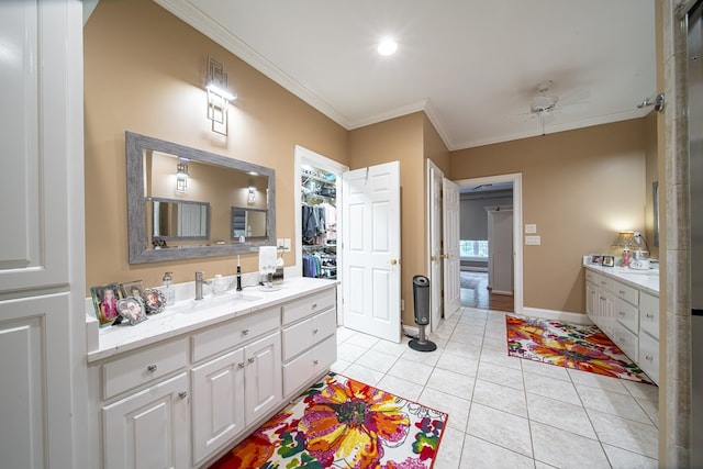 bathroom featuring crown molding, ceiling fan, vanity, and tile patterned flooring