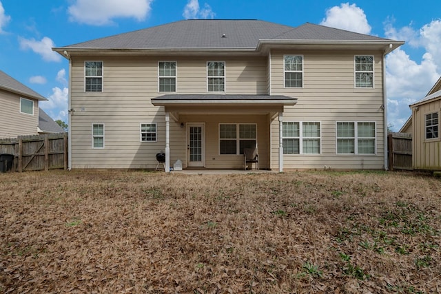 back of house featuring a patio