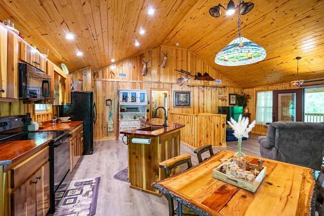 153 N Whatley Rd, Lagrange, GA 30240 - dining area with vaulted ceiling, wooden walls, light wood finished floors, and wooden ceiling
