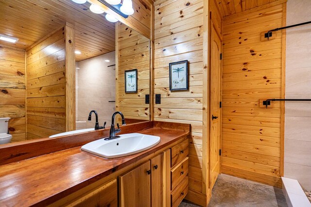 153 N Whatley Rd, Lagrange, GA 30240 - bathroom with wooden walls, toilet, vanity, and wooden ceiling