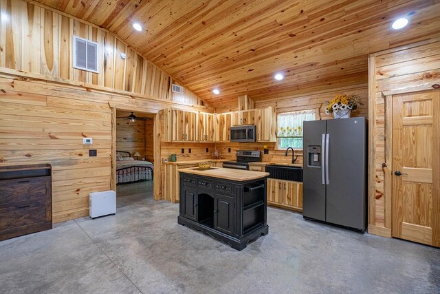 153 N Whatley Rd, Lagrange, GA 30240 - kitchen featuring appliances with stainless steel finishes, a sink, wooden ceiling, vaulted ceiling, and finished concrete flooring