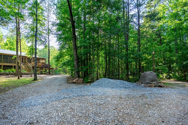 153 N Whatley Rd, Lagrange, GA 30240 - view of dirt / gravel road featuring stairs and a wooded view