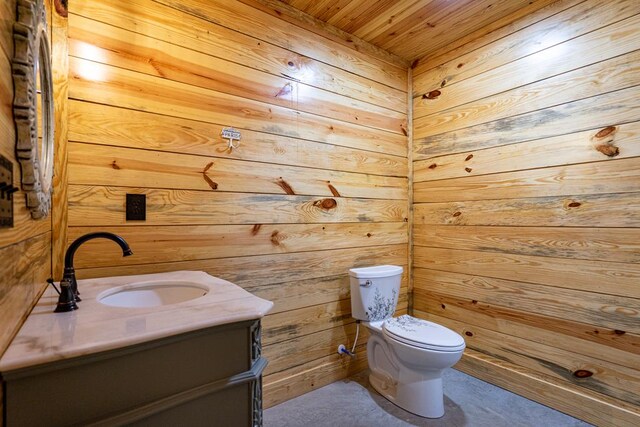 153 N Whatley Rd, Lagrange, GA 30240 - half bathroom with wood walls, vanity, toilet, and wood ceiling