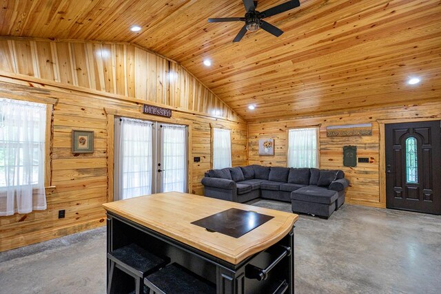 153 N Whatley Rd, Lagrange, GA 30240 - living area with finished concrete floors, wooden ceiling, wooden walls, ceiling fan, and recessed lighting