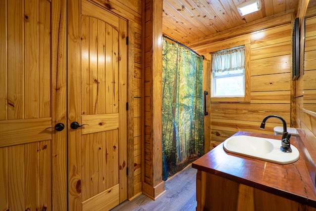 153 N Whatley Rd, Lagrange, GA 30240 - bathroom with wood walls, vanity, wood finished floors, wood ceiling, and a shower with curtain