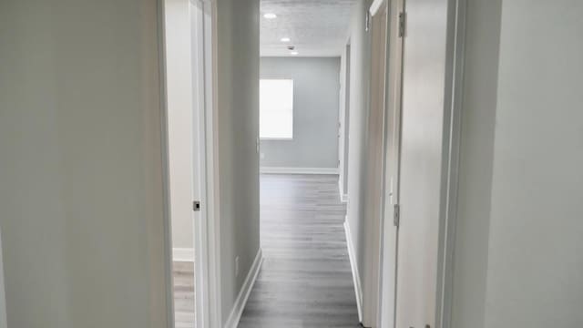 2830 N Lumpkin Rd, Columbus, GA 31903 - hall featuring baseboards and wood finished floors