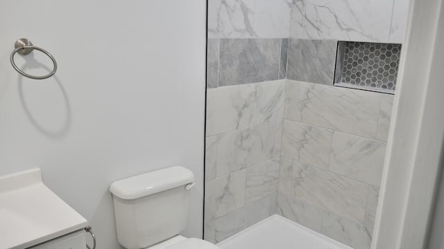 2830 N Lumpkin Rd, Columbus, GA 31903 - bathroom with vanity, toilet, and a tile shower