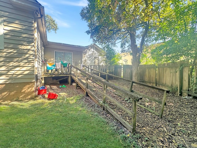 view of yard featuring a deck