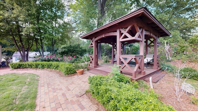 view of community with a gazebo and a deck