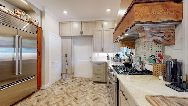 kitchen featuring recessed lighting, light countertops, visible vents, and stainless steel appliances