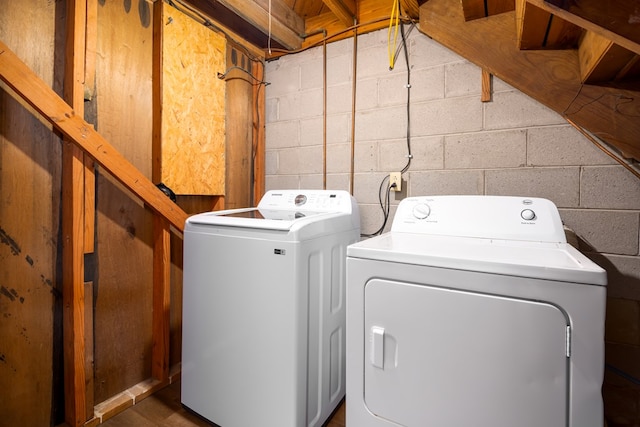 laundry room featuring separate washer and dryer