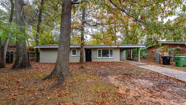 view of front of house featuring a carport