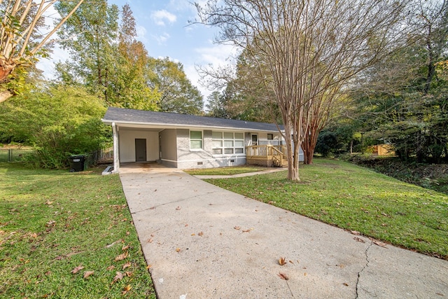 view of front of property featuring a carport and a front lawn