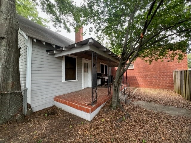 3609 Hamilton Rd, Columbus, GA 31904 - view of side of home featuring a chimney