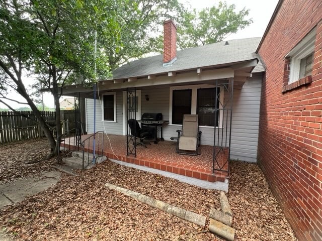 3609 Hamilton Rd, Columbus, GA 31904 - back of house with a patio and a chimney