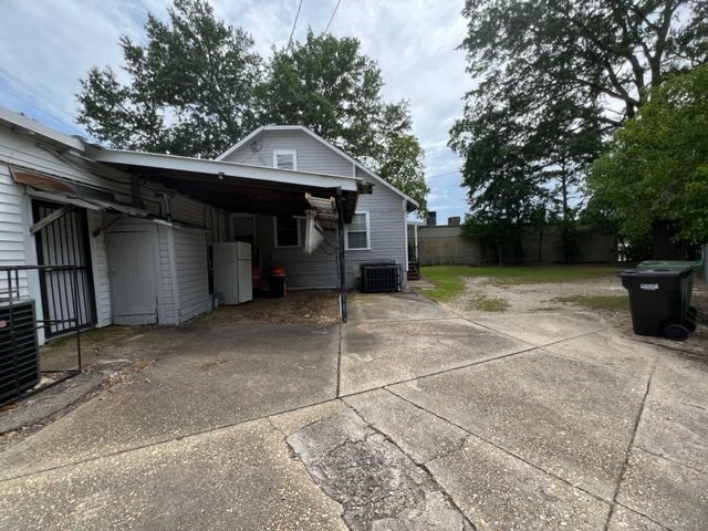 3609 Hamilton Rd, Columbus, GA 31904 - view of side of home featuring driveway and an attached carport