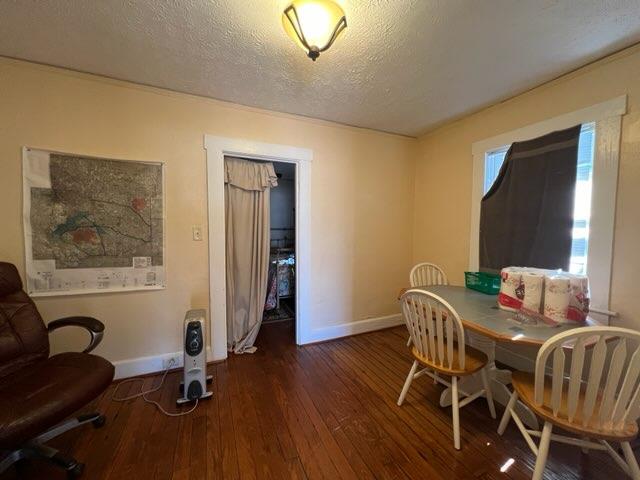 3609 Hamilton Rd, Columbus, GA 31904 - dining space with hardwood / wood-style floors and a textured ceiling