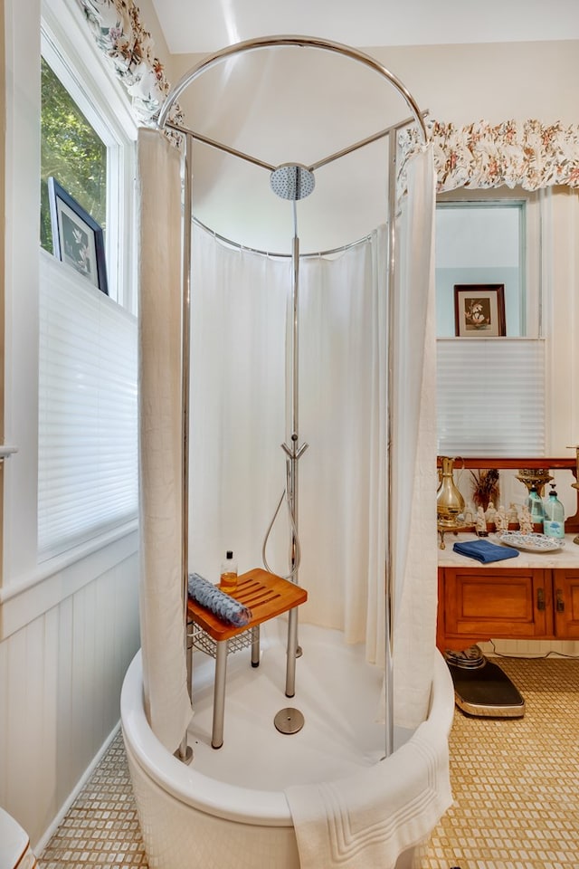 bathroom with a shower with curtain