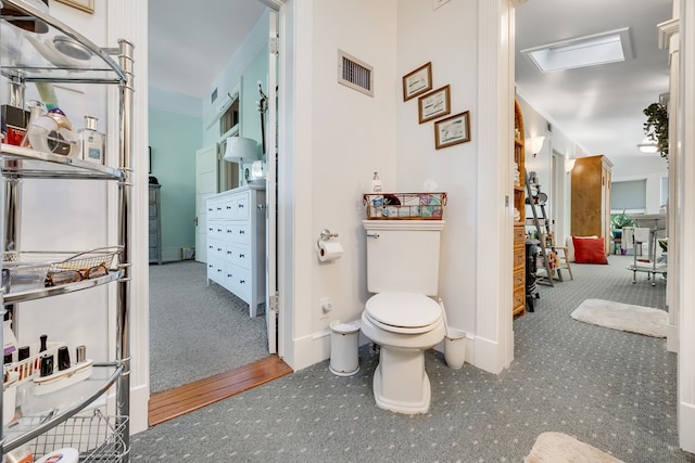 bathroom featuring toilet