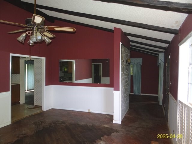 1469 Wall St, Richland, GA 31825 - unfurnished room featuring a ceiling fan, a wainscoted wall, and wood finished floors